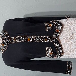 Vintage Lisa Nichols P M black cardigan with beaded trim and shoulder pads